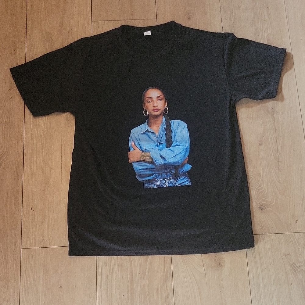 Stylish Black Graphic Tee with Iconic Portrait